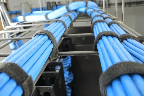 Cat6 cable bundles dressed into the network rack — DigiCo Wiring, Los Angeles